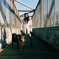 Full length of woman standing in city