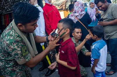 Group of people standing outdoors