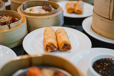 Close-up of dim sums served on table