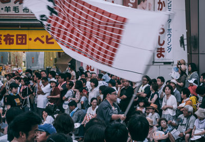 People standing on street in city