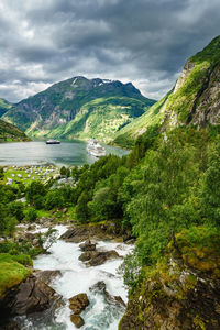 Scenic view of river passing through forest