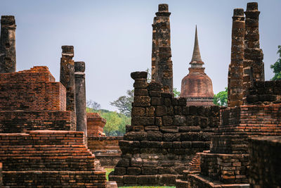 Old temple building against sky