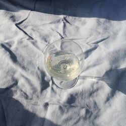 High angle view of drinking glass on table