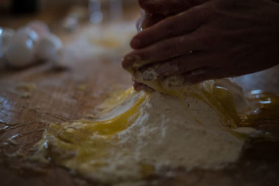 Close-up of person preparing food