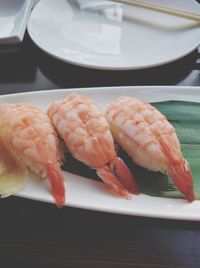 Close-up of stuffed prawns served in plate