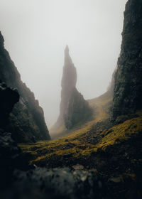 Rear view of woman standing on mountain isle of skye 