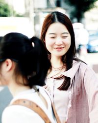 Portrait of a smiling young woman