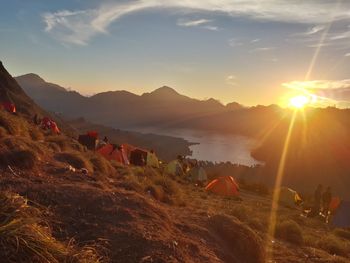 Scenic view of sunset over mountains