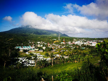 Aerial view of townscape against sky