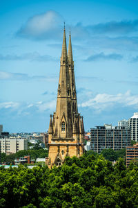 View of building against cloudy sky