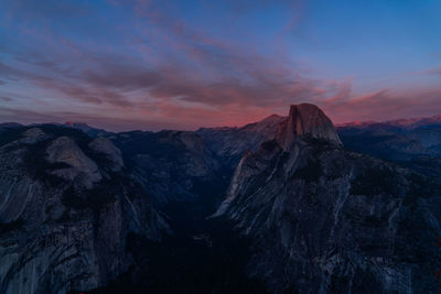 Scenic view of mountains against sky during sunset