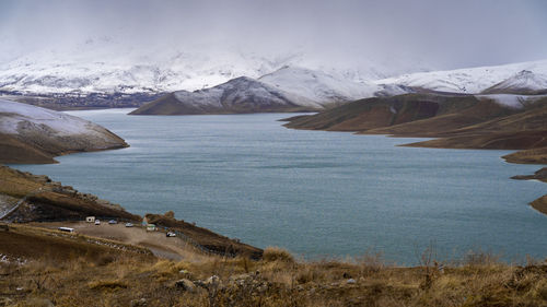 Scenic view of snowcapped mountains against sky