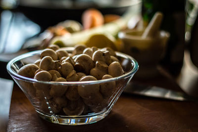 Close-up of mushrooms in bowl on table