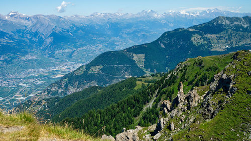 High angle view of landscape and mountains against sky