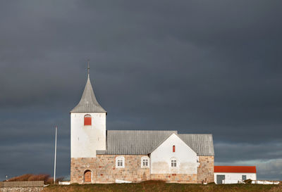 Tower of historic building against sky