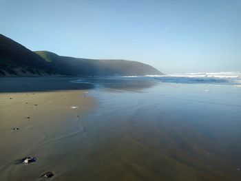 Scenic view of sea against clear sky