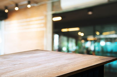 Empty tables and chairs at restaurant