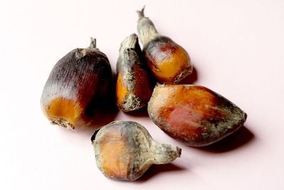 Close-up of fruits against white background