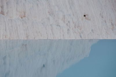 High angle view of wall by sea