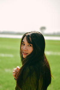 Portrait of a smiling young woman