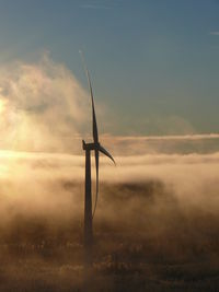 Wind turbines on field