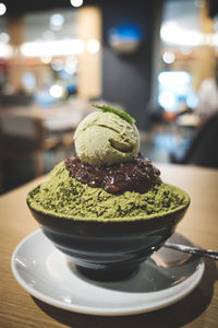 Close-up of ice cream in plate on table