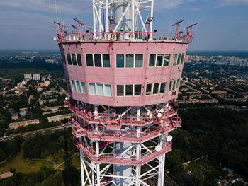 High angle view of ship in sea against buildings in city