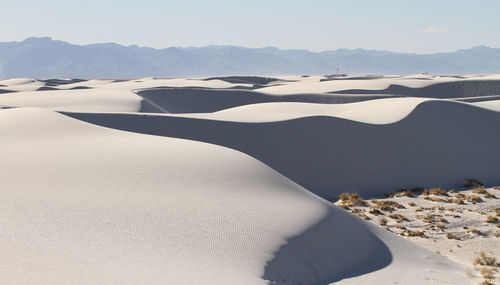 Gypsum sand dunes in white sands national park in late afternoon