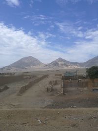 Scenic view of desert against sky