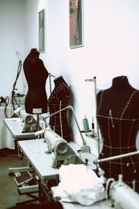 Black mannequins in a sewing workshop