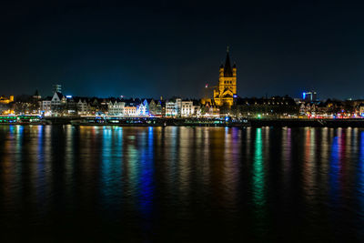 Illuminated buildings at waterfront