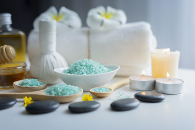 Close-up of candles on table