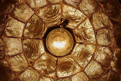 Low angle view of illuminated ceiling