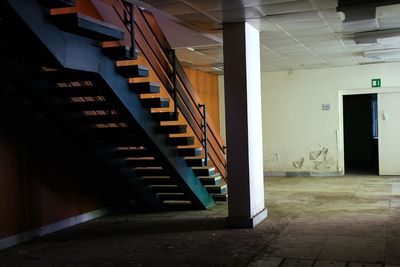 Empty alley along buildings