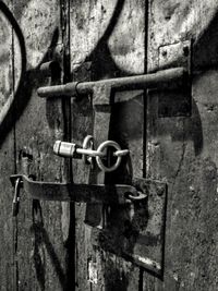 Close-up of padlocks on metal