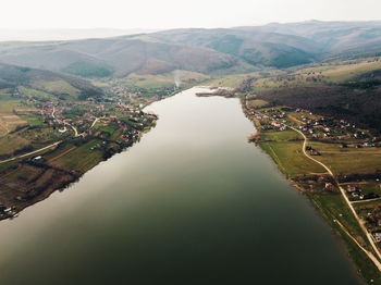 High angle view of river amidst mountains