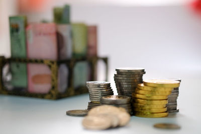 Close-up of coins on table