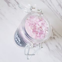 High angle view of glass jar on table