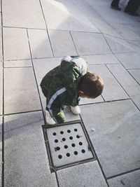 Rear view of man on footpath