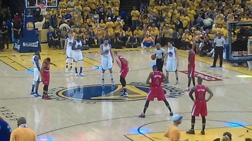 Group of people playing basketball court