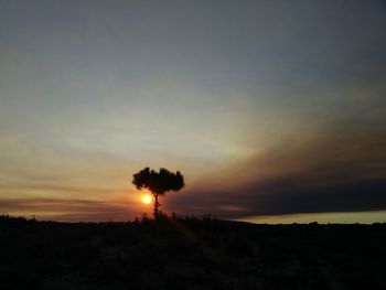 Scenic view of silhouette landscape against sky during sunset