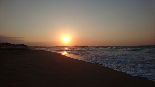 Scenic view of beach during sunset