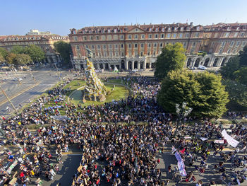 High angle view of people against buildings in city