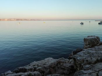 Scenic view of sea against clear sky