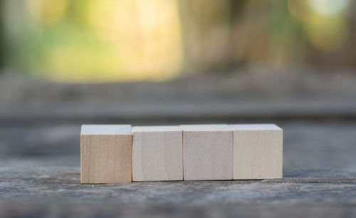 Close-up of wooden blocks on table