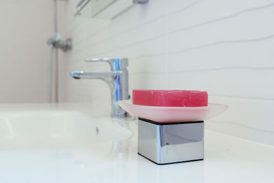 Close-up of faucet in bathroom
