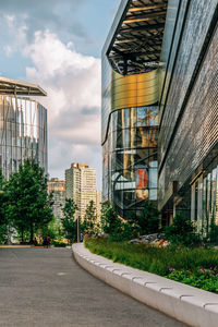 Street amidst buildings against sky