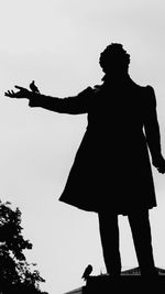 Low angle view of statue against clear sky