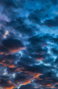 Low angle view of dramatic sky