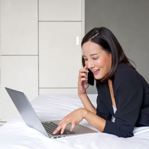 Young woman using mobile phone